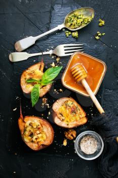 baked pears with cheese nuts honey, stock photo