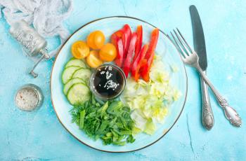 vegetables for salad, fresh vegetables and sauce