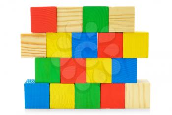 Colourful wall from toys wooden cubes isolated on white background