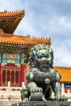 Bronze lion in front of the Hall of Supreme Harmony in Beijing Forbidden City, China