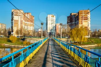 Bridge across a lake in Kiev, the capital of Ukraine. General Vatutin Avenue, Troieshchyna district