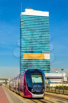 Ground-level power supply tram in Jumeirah, Dubai