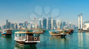 Traditional boats at the Dhow Harbor in Doha, Qatar