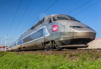 STRASBOURG, FRANCE - SEPTEMBER 22: SNCF TGV train on a way from Paris to Strasbourg on September 22, 2013 in Strasbourg, France. The second phase of high-speed railway between Strasbourg and Paris LGV Est will be opened in 2016
