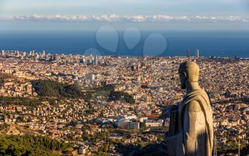 Sculpture of Apostle and view of Barcelona