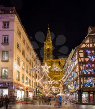 STRASBOURG, FRANCE - DECEMBER 15: View of Notre-Dame de Strasbourg with Christmas illumination on December 15, 2013 in Strasbourg, France. Strasbourg is called The Capital of Christmas thanks to the oldest European Christmas market