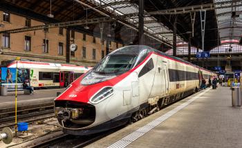 Basel, Switzerland - May 8, 2014: New Pendolino high-speed tilting train at Basel railway station. This train is owned by SBB CFF FFS - Swiss Federal Railways