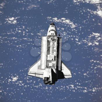 Royalty Free Photo of the Space Shuttle Discovery in Orbit