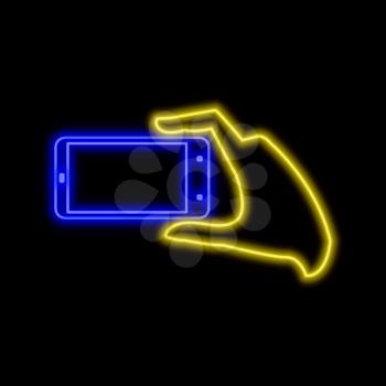 Hand with smartphone making photo neon sign. Bright glowing symbol on a black background. Neon style icon. 