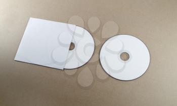 Blank compact disk on a table. Mock-up for branding identity for designers.