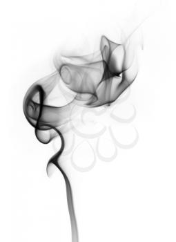 Photo of abstract black smoke swirls isolated on white background