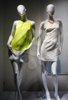 Fashion concept. Photo of two elegant female mannequins demonstrating clothes.