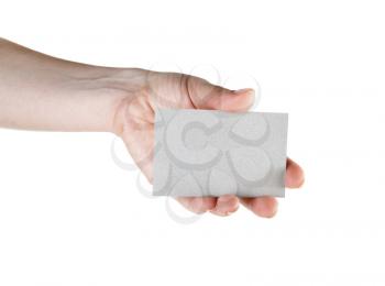 Blank business card in hand isolated on white background. Clipping path.