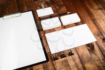 Photo of blank stationery set. Blank corporate identity template for branding identity for designers. Mockup for ID. Letterhead, business cards, badge, envelope and pencil.