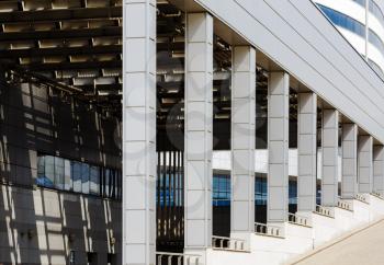 MINSK, BELARUS - MAY 03, 2016: Minsk-Arena - a sports and entertainment complex in the city of Minsk, Belarus. Close-up of modern industrial architecture with a colonnade.