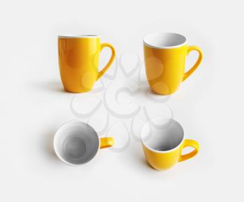 Yellow ceramic mugs. Cups for coffee or tea. Responsive design mockup.