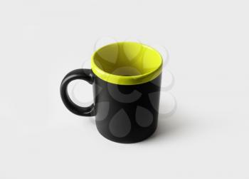 Blank black ceramic mug or cup for coffee or tea.