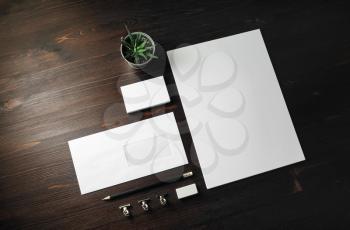 Blank stationery template on wood table background. Mockup for branding identity.