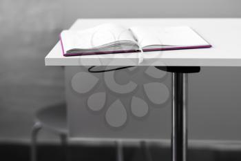 Opened book on table backdrop hd
