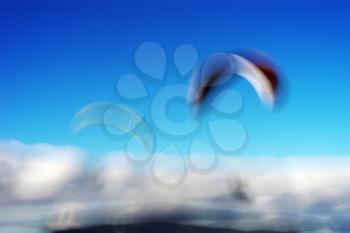 Couple of flyers with flying kites bokeh background hd