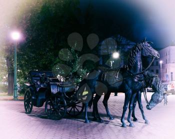 Two horses monument in Minsk Belorussia vignette background backdrop