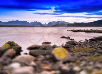 Horizontal typical Norway landscape with bridge bokeh vignette background backdrop