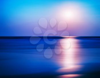 Horizontal vibrant ocean sunset milk motion abstraction background backdrop