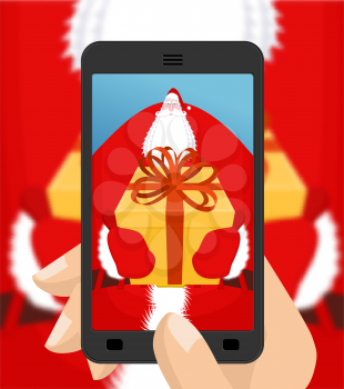 Christmas Photo Santa to give gift. Photographing your smartphone. Santas gloves and  box with bow. Illustration for new year. Xmas template design
