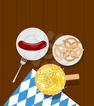 Oktoberfest food. Beer and sausages. Pretzels in plate. Meal for German festival
