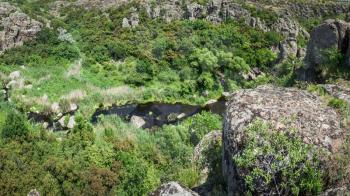 Panoramic view of Aktovskiy Canyon, Nikolayev region, Ukraine. River Mertvovod in a sunny summer day. One of natural wonders of Europe