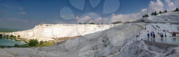 Pamukkale, Turkey – 07.15.2019. White limestone mineral fields in Pamukkale, Turkey, on a sunny summer day.