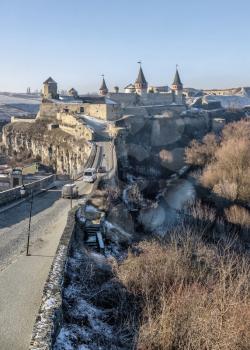 Kamianets-Podilskyi, Ukraine 01.07.2020. Panoramic view of the Castle bridge to Kamianets-Podilskyi fortress on a sunny winter morning