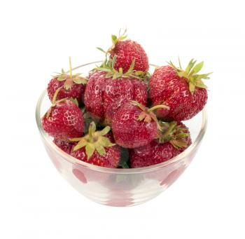 Strawberries in glass plate isolated on white background
