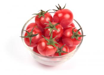 Cherry tomatoes in glass plate isolated on white background