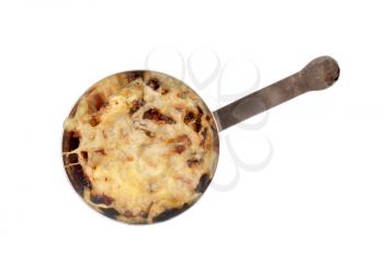 Mushroom julienne in a cocotte isolated on white background