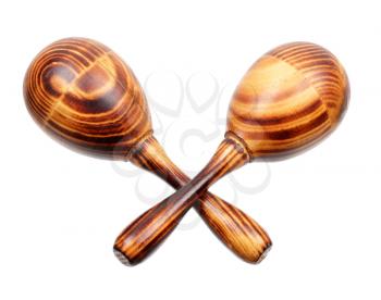 Two wooden maracas with a typical wood structure isolated on white background