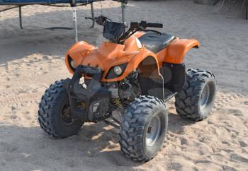 Small ATV rentals. Rental services on the beach by the sea.