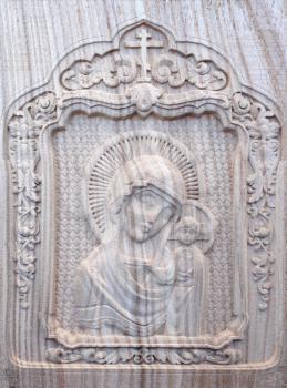 Carving on the machine with numerical control. Cut cutter machine icon of the Virgin Mary and Jesus.