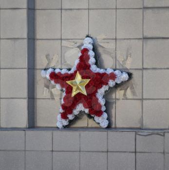 Garland in the form of a five-pointed star. Flowers of the Victory Day.
