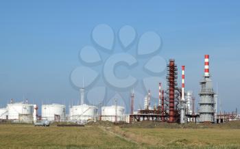 Distillation columns, pipes and other equipment furnaces refinery. The oil refinery. Equipment for primary oil refining.                            