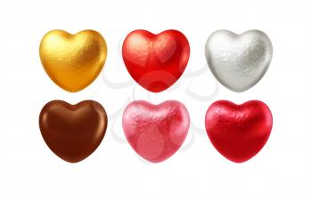 Set of realistic heart shaped chocolates wrapped in foil candy wrapper. Festive design element for Happy Valentines Day. Vector illustration EPS10