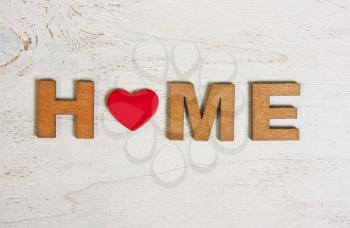 the word home made of wooden letters on a white background  wooden