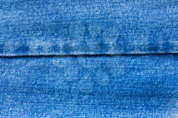Abstract background, texture with embroidered denim blue fabric