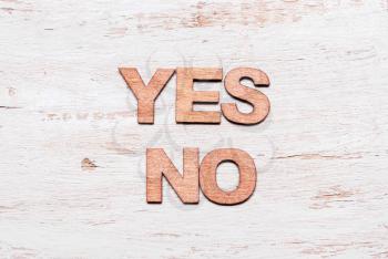 Words yes no in wooden letters. The concept of choice, decision, consent, denial