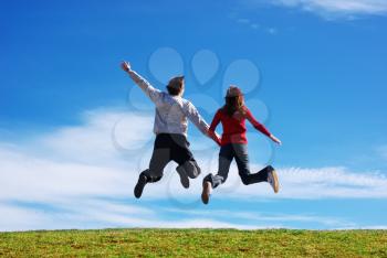 Couple jump in the meadow. Conceptual design.
