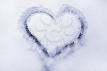 Heart on the snow. Element of design.