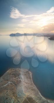 Aerial view of the sea shore at sunset. Nature composition.