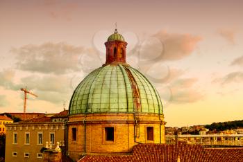 dome of Cathedral under golden rays of setting sun Ancona Italy