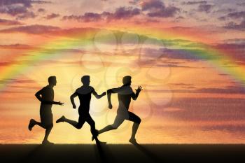 Running sports. Competition athletes three runners on the background of rainbow, rain, and sea sunset