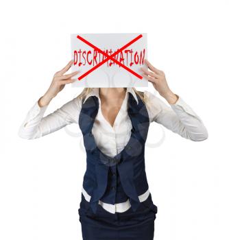 Discrimination concept. A woman holds a poster with the word crossed out discrimination